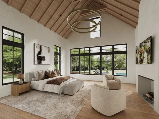 a bedroom with furniture and a large window