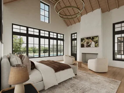 a spacious bedroom with a large bed and a chandelier