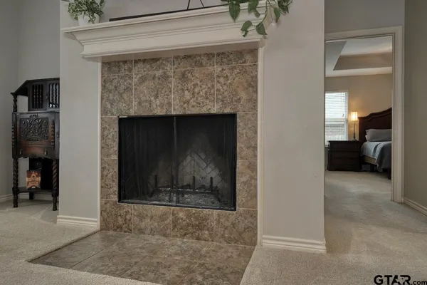 a living room with a fireplace in it