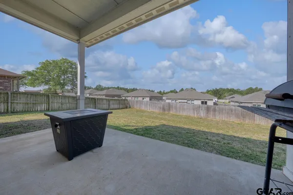 a view of a lake with a big yard