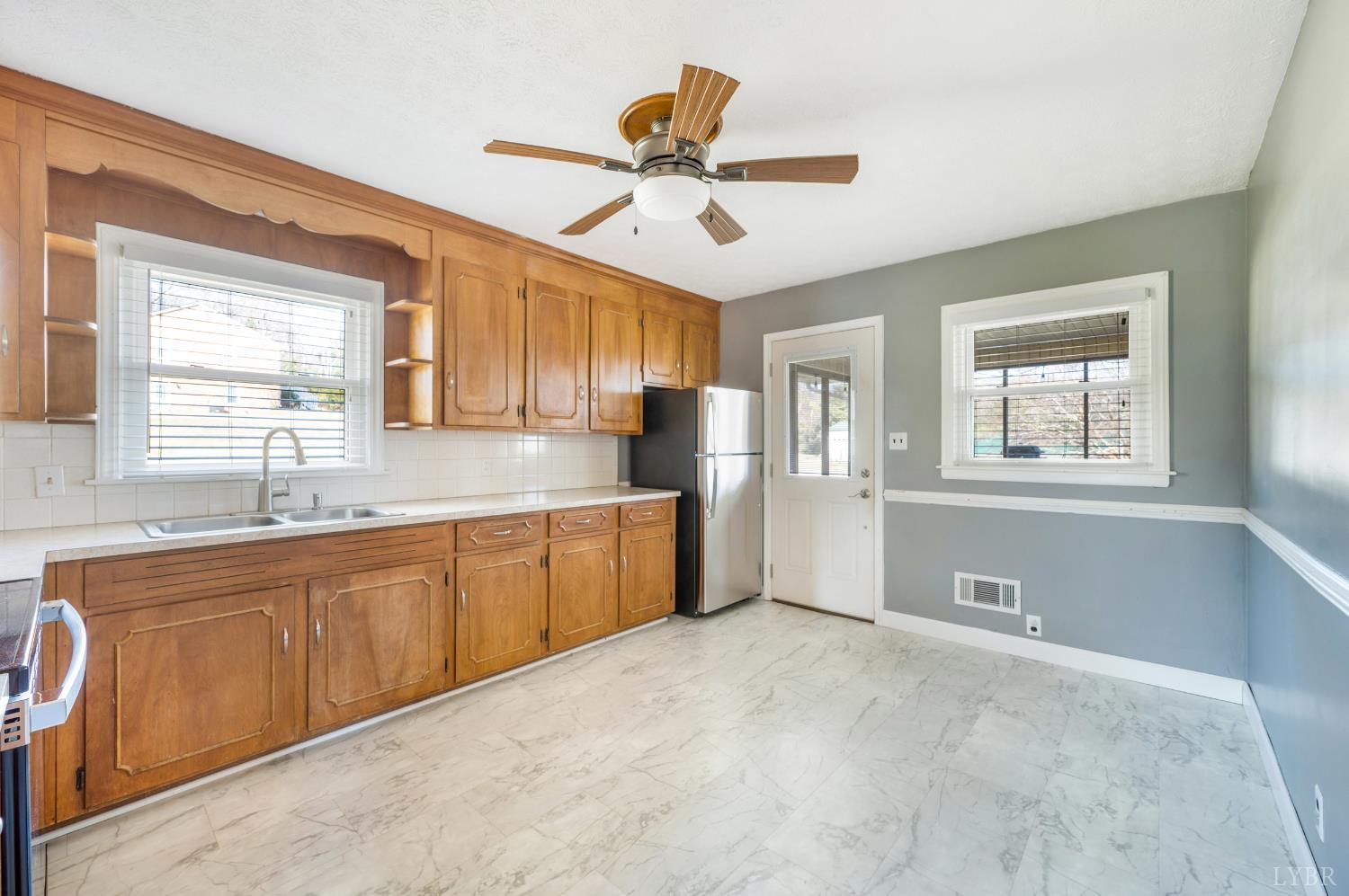 492 Greendale Drive Rustburg, VA 24588 - Photo 6 of 39 a view of a kitchen with sink and cabinet area