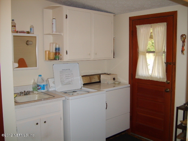 35119 Braddock Road Callahan, FL 32011 - Photo 17 of 19 Inside Laundry Rm with utility sink