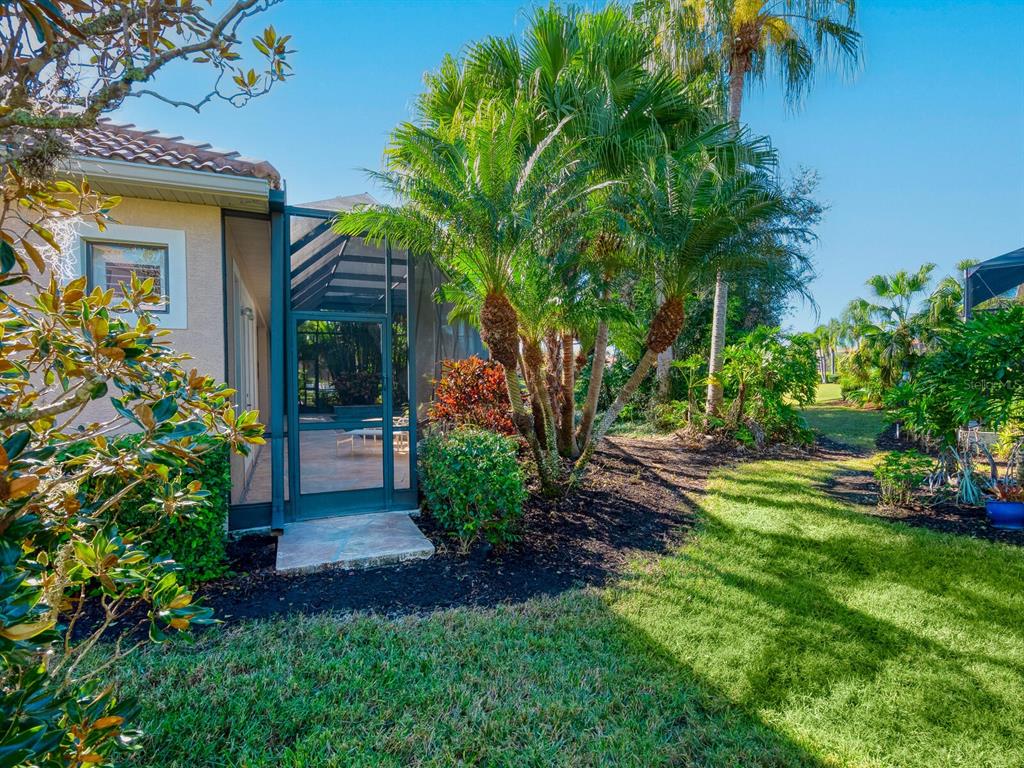 13911 Siena Loop Lakewood Ranch, FL 34202 - Photo 46 of 63 a view of a yard in front of house