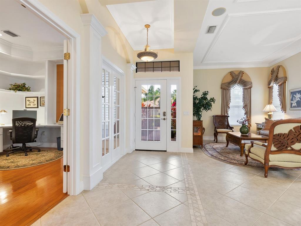 13911 Siena Loop Lakewood Ranch, FL 34202 - Photo 7 of 63 a view of a livingroom with furniture and a livingroom