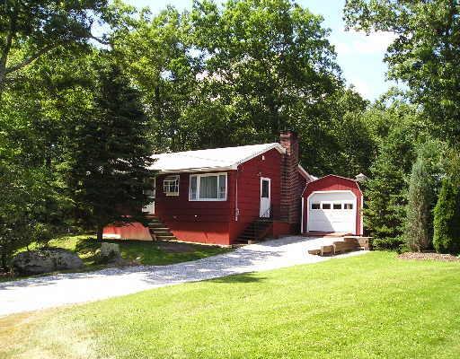 67 Carter Road Warren, CT 06754 - Photo 1 of 1 a front view of a house with a yard