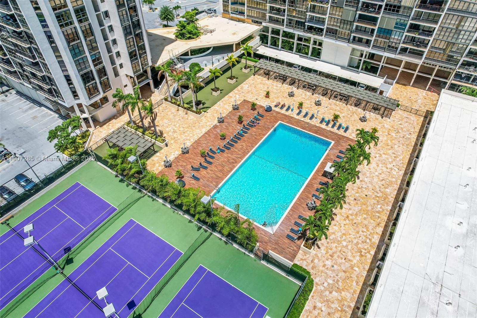 1925 Brickell Avenue, Unit 1811 Miami, FL 33129 - Photo 37 of 63 a view of swimming pool with a yard
