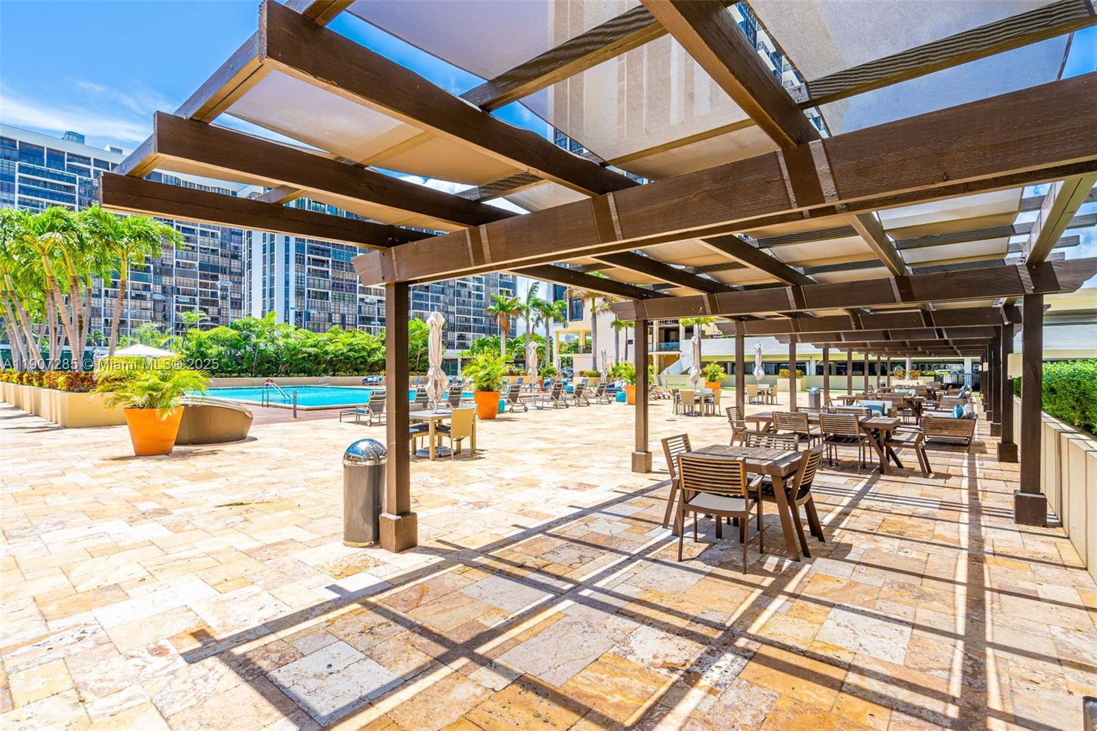 1925 Brickell Avenue, Unit 1811 Miami, FL 33129 - Photo 47 of 63 a view of a swimming pool with a patio