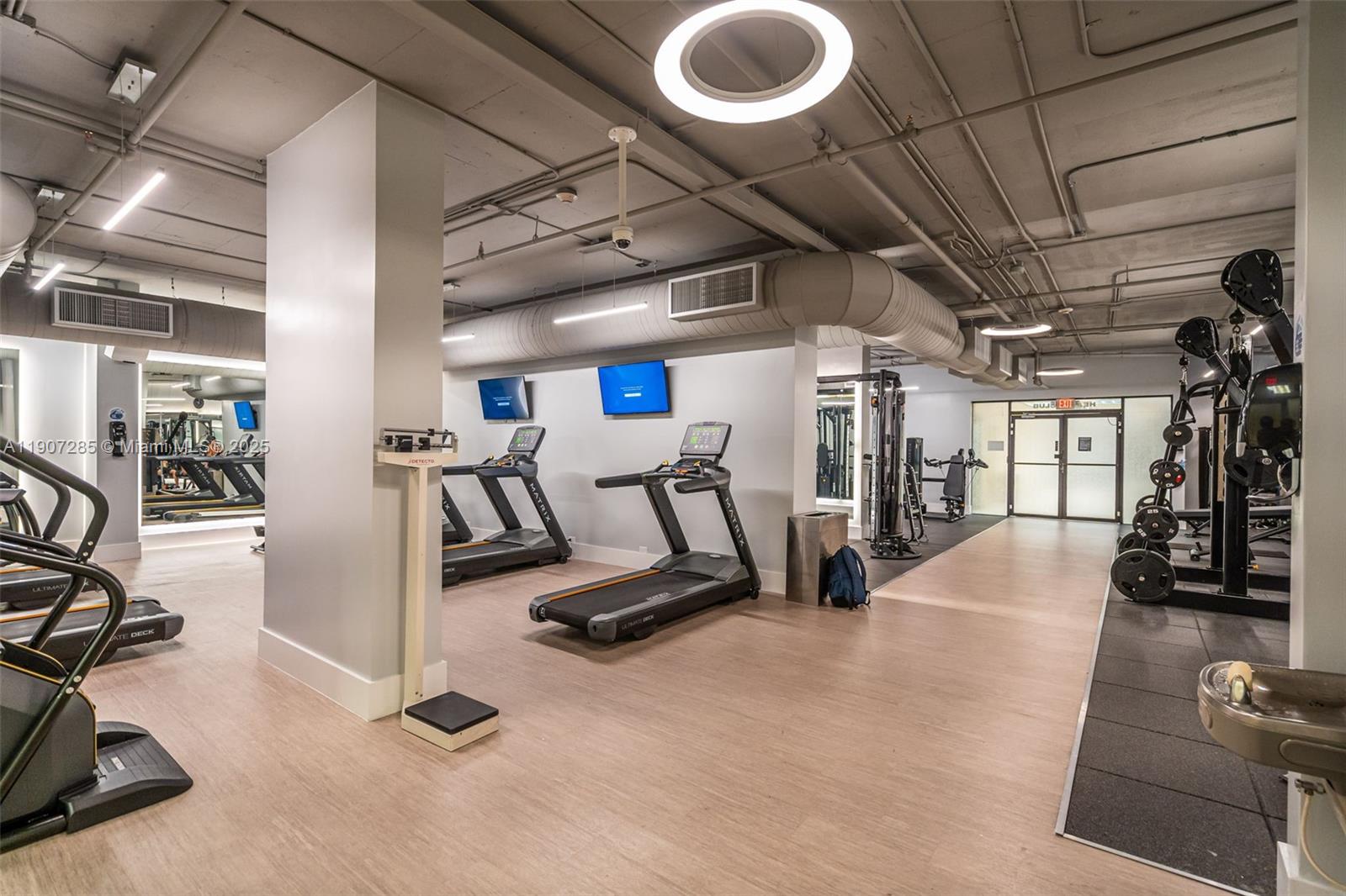 1925 Brickell Avenue, Unit 1811 Miami, FL 33129 - Photo 52 of 63 a view of a room with gym equipment