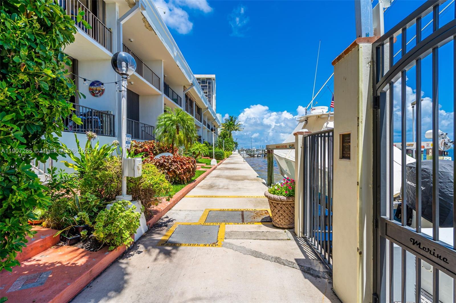 1925 Brickell Avenue, Unit 1811 Miami, FL 33129 - Photo 59 of 63 a view of a house with a yard and potted plants