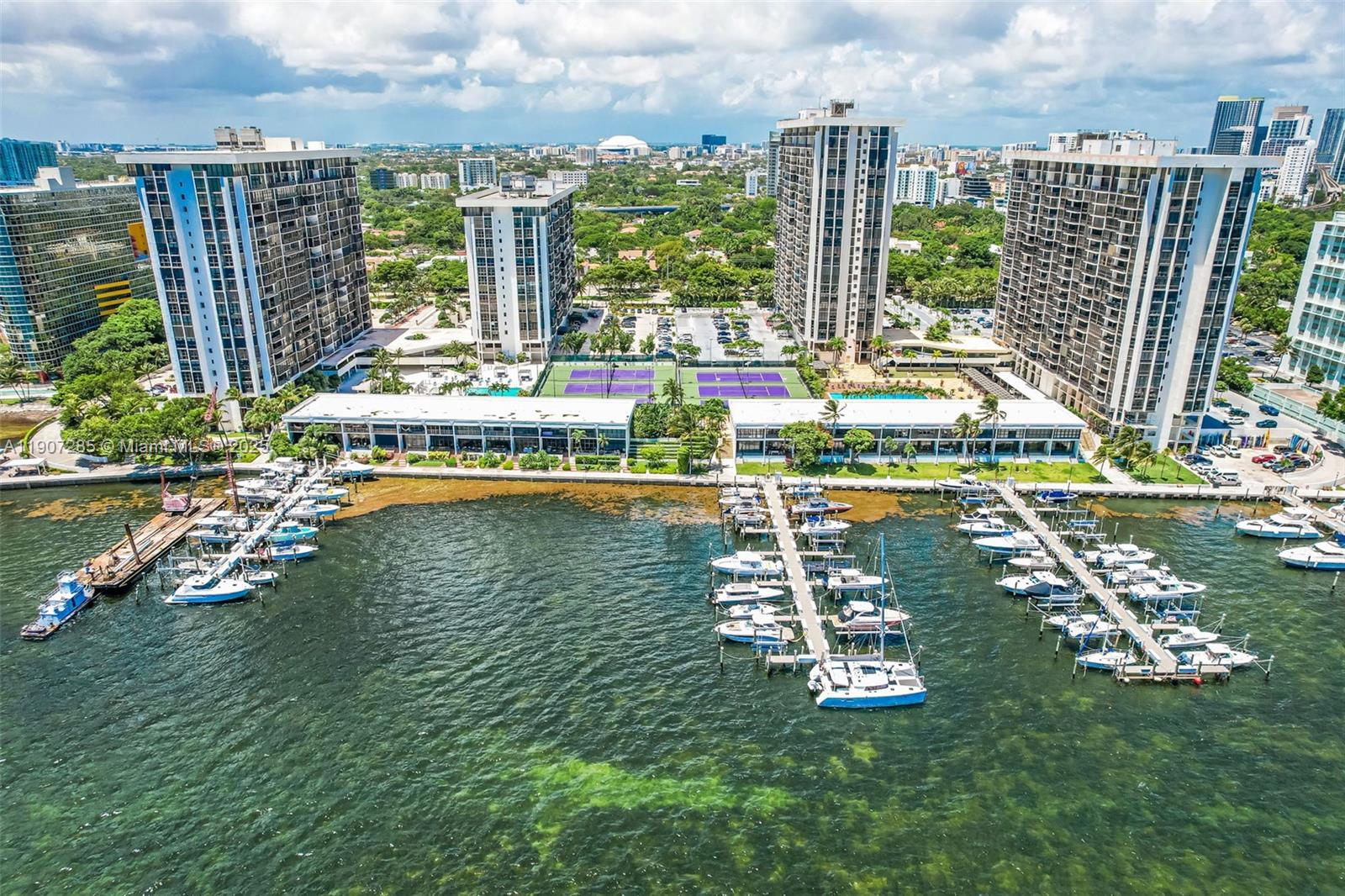 1925 Brickell Avenue, Unit 1811 Miami, FL 33129 - Photo 61 of 63 a view of a city with tall buildings