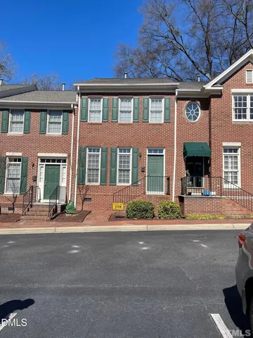 a front view of a building with a outdoor view
