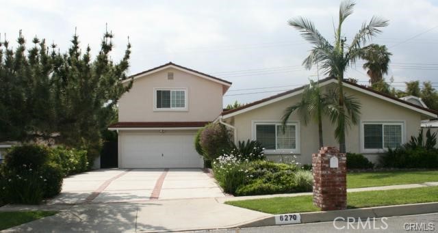 6270 Malvern Avenue Rancho Cucamonga, CA 91737 - Photo 1 of 1 a front view of a house with garden