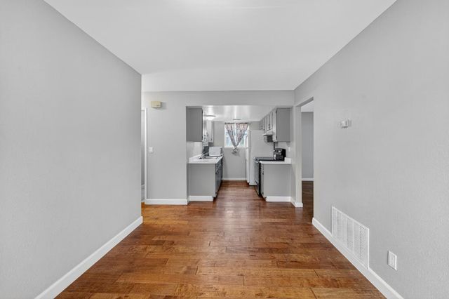 a view of a kitchen with a sink