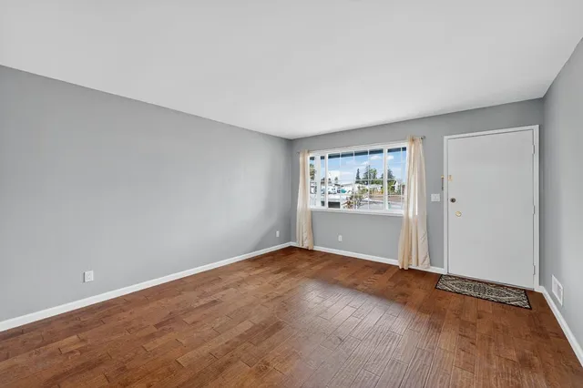 an empty room with windows