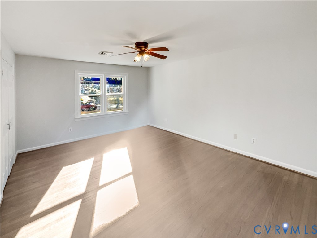 310 Burnwick Road Richmond, VA 23227 - Photo 14 of 21 a view of room with window and ceiling fan