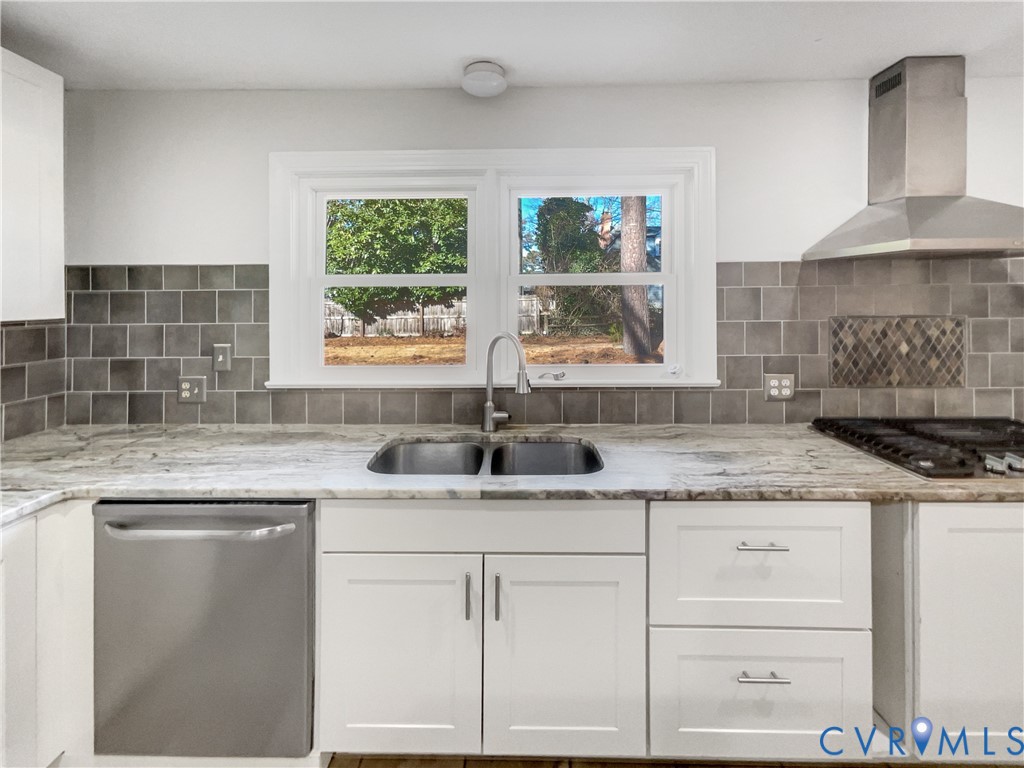 310 Burnwick Road Richmond, VA 23227 - Photo 10 of 21 a kitchen with granite countertop a sink and a window