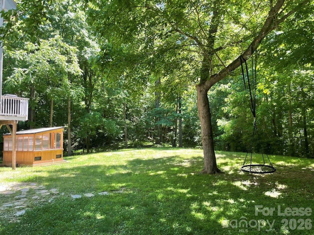 3800 Oldfield Road Charlotte, NC 28226 - Photo 31 of 32 a view of a tree in a yard