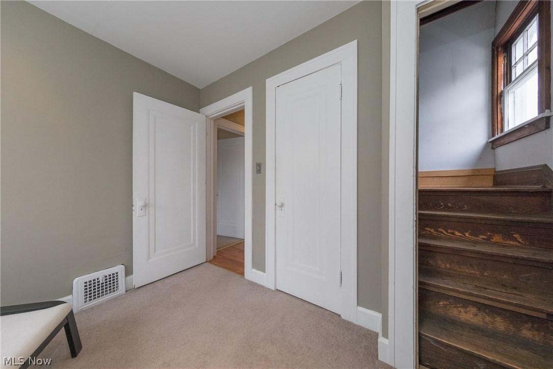 3996 Rosemond Road Cleveland Heights, OH 44121 - Photo 20 of 29 The Third Bedroom with natural wood staircase leading to the top floor