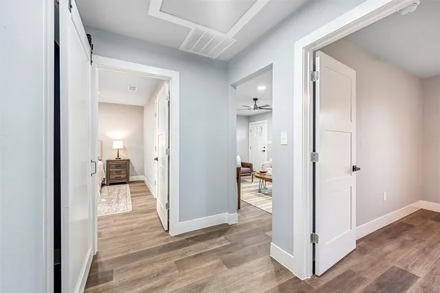 wooden floor with white walls