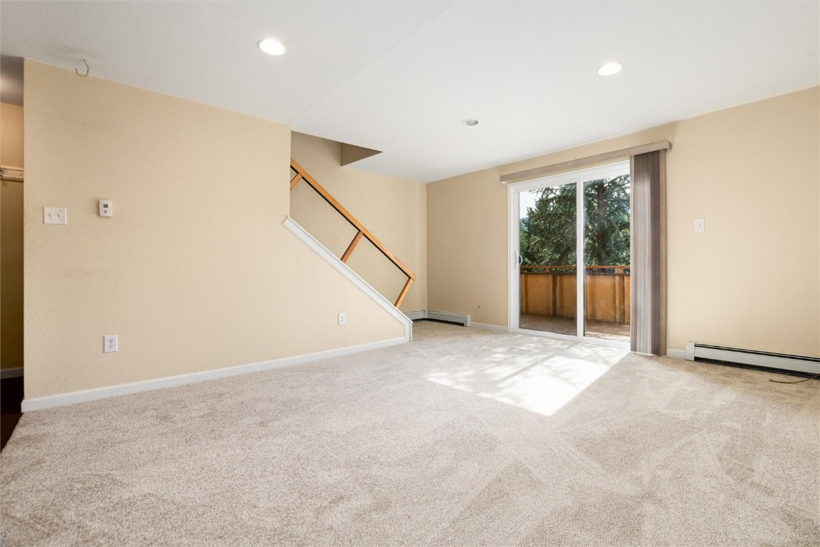 163 High Tor Road, Unit 2 Breckenridge, CO 80424 - Photo 11 of 48 a view of an empty room with glass door