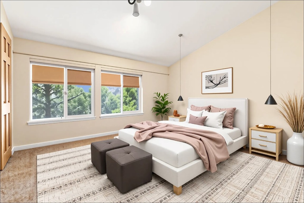 163 High Tor Road, Unit 2 Breckenridge, CO 80424 - Photo 2 of 48 a bedroom with a bed and a large window