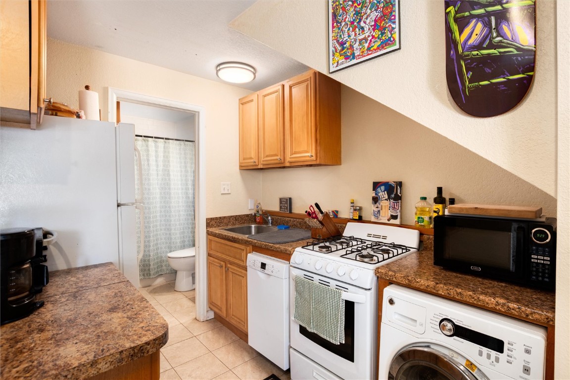 163 High Tor Road, Unit 2 Breckenridge, CO 80424 - Photo 26 of 48 a kitchen with a stove and a sink