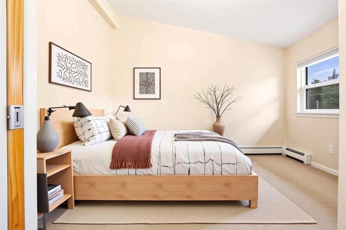 163 High Tor Road, Unit 2 Breckenridge, CO 80424 - Photo 3 of 48 a bedroom with bed and window