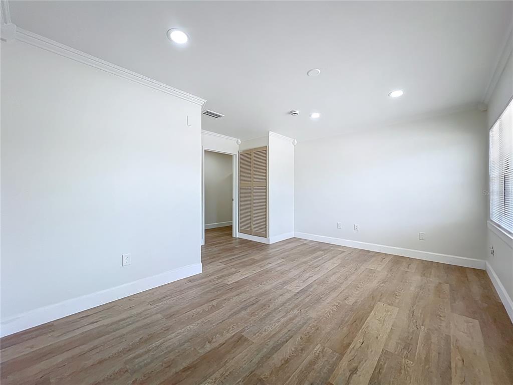 507 East Street Longwood, FL 32750 - Photo 30 of 72 a view of an empty room with wooden floor