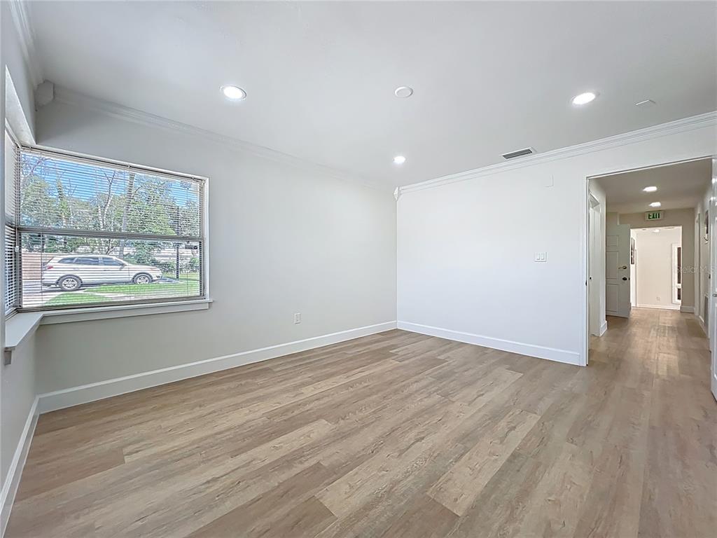 507 East Street Longwood, FL 32750 - Photo 32 of 72 wooden floor in an empty room with a window