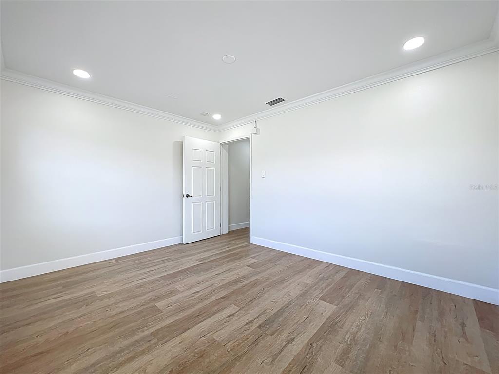 507 East Street Longwood, FL 32750 - Photo 34 of 72 a view of an empty room with wooden floor