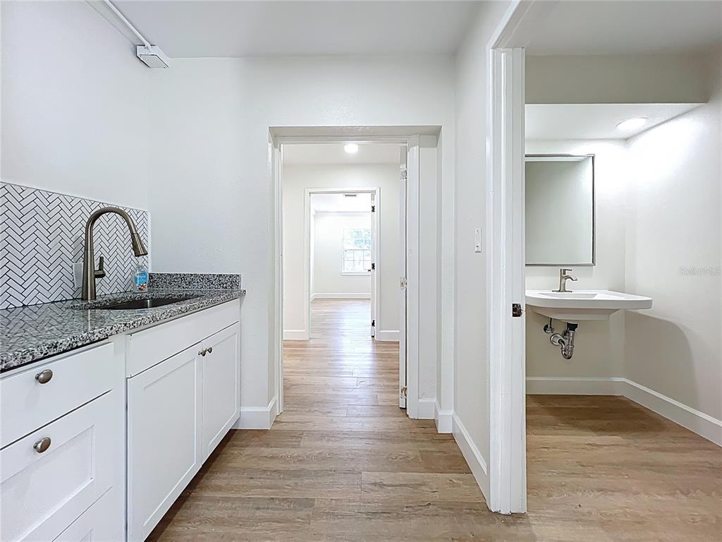 507 East Street Longwood, FL 32750 - Photo 38 of 72 a bathroom with a sink and a mirror