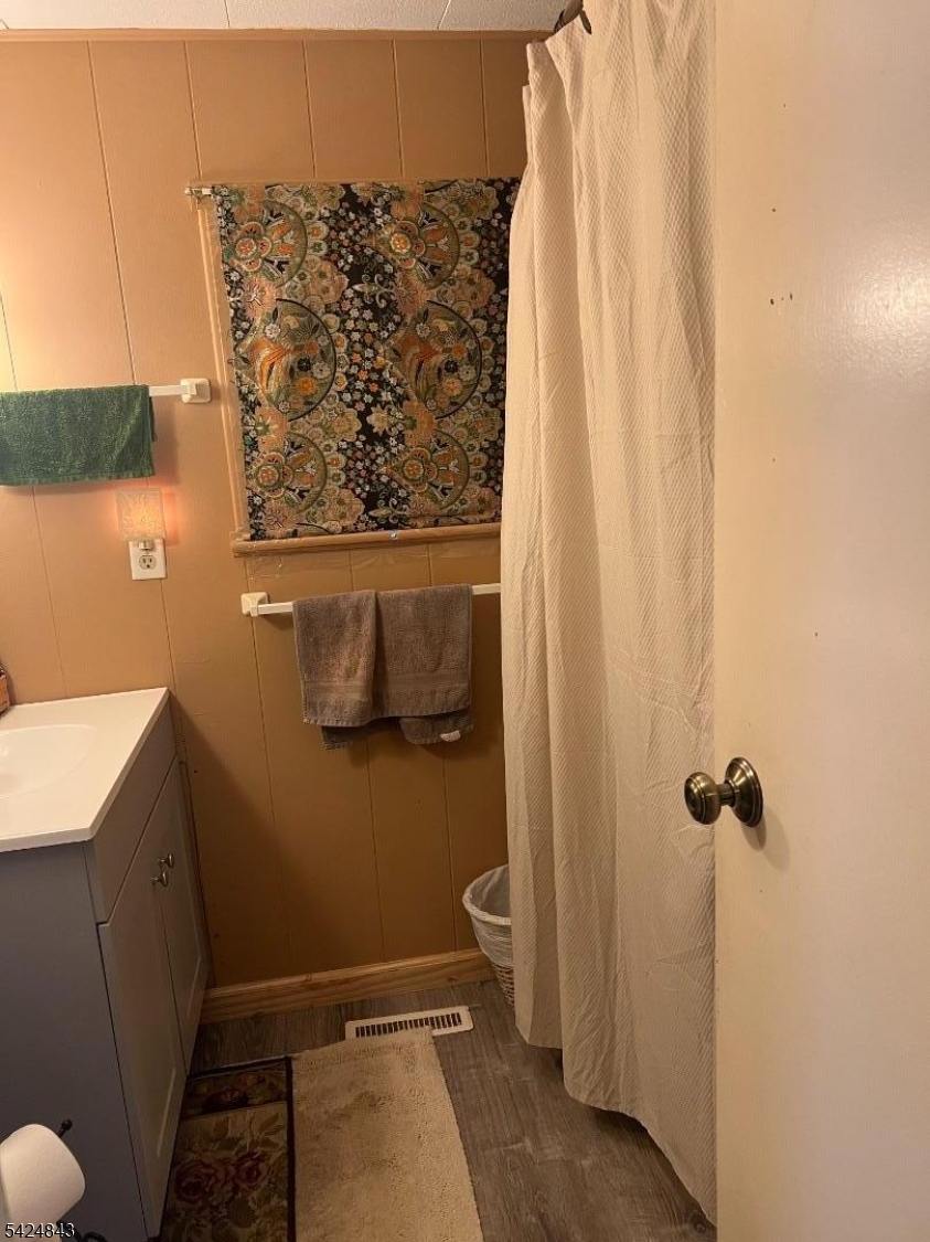 55 Back Street Oxford, NJ 07863 - Photo 11 of 16 a bathroom with a shower and a sink