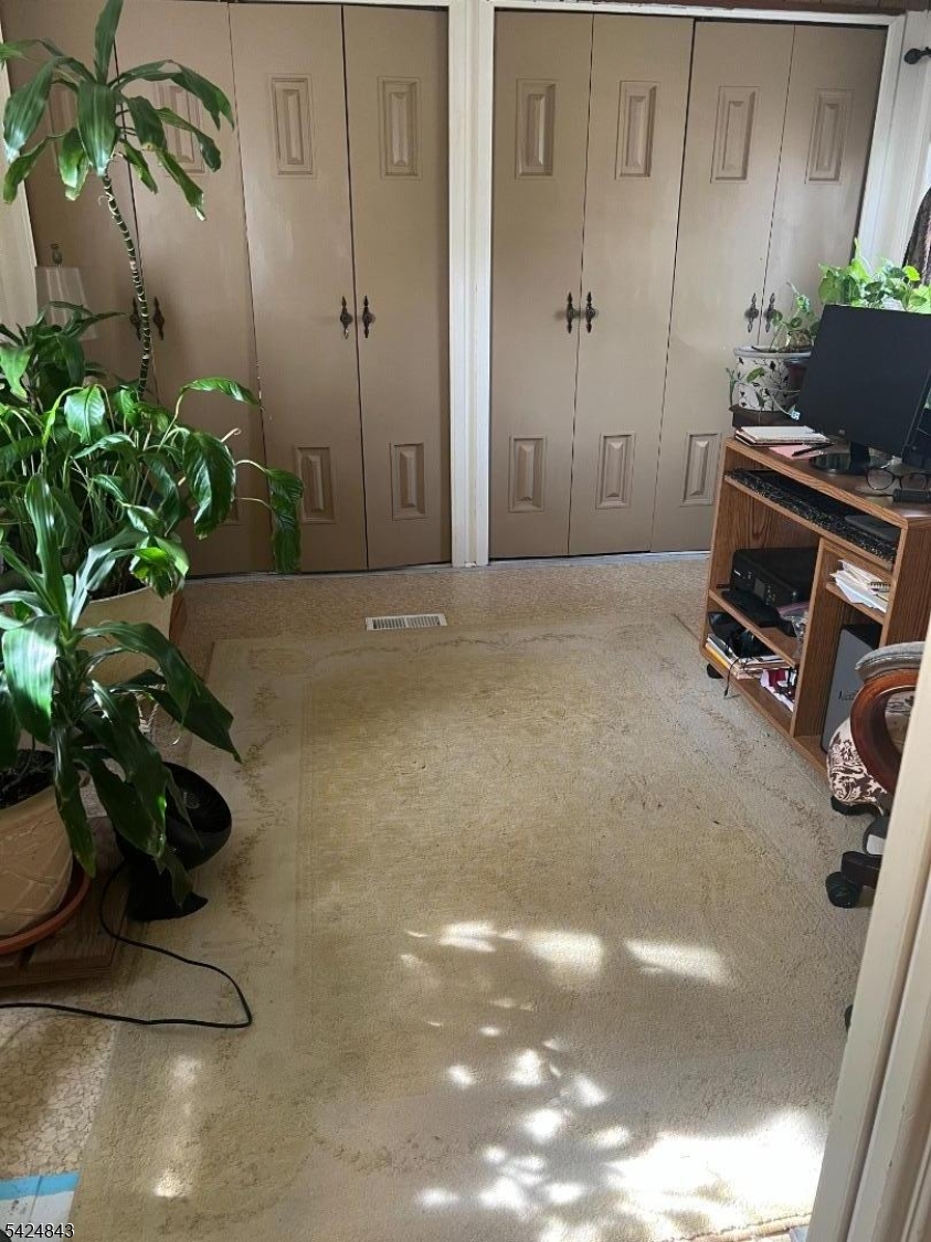 55 Back Street Oxford, NJ 07863 - Photo 13 of 16 a view of a livingroom with a potted plant