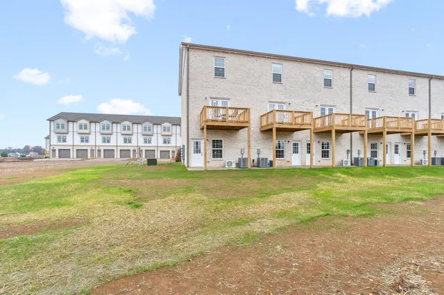 a front view of building with outdoor space