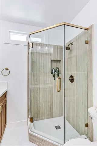 a bathroom with a shower and a tub