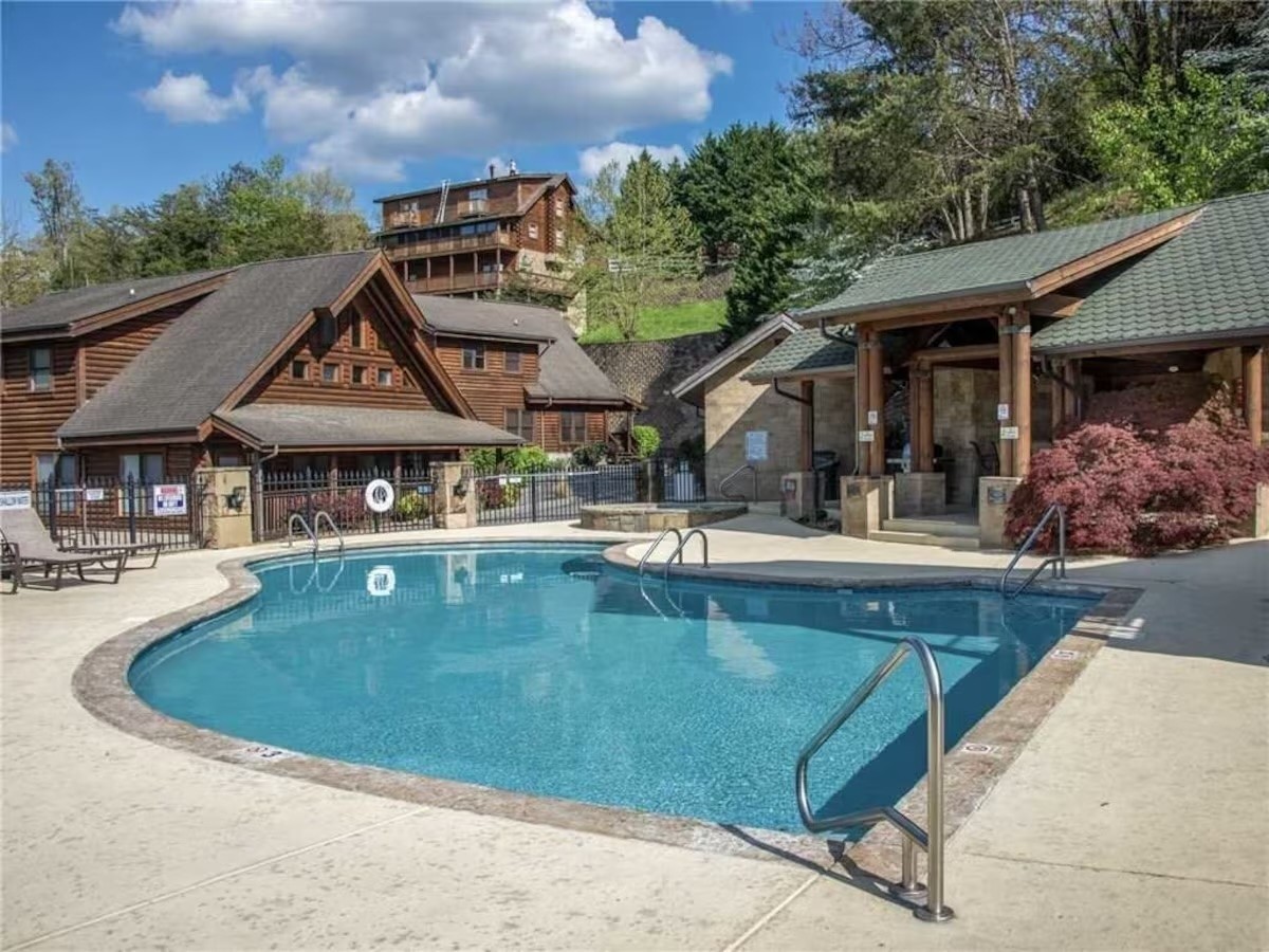 839 Golf View Boulevard Sevierville, TN 37863 - Photo 2 of 8 a view of a house with pool and chairs
