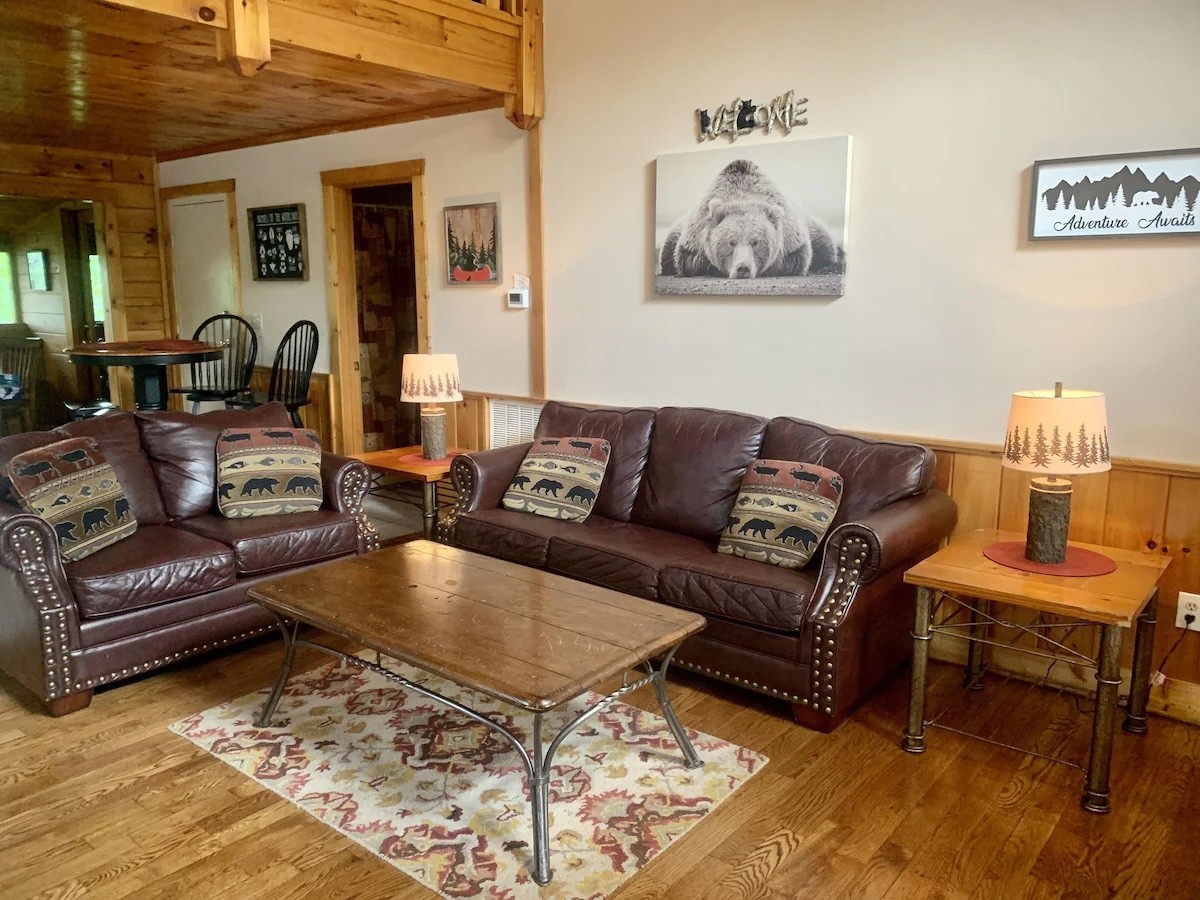 839 Golf View Boulevard Sevierville, TN 37863 - Photo 8 of 8 a living room with furniture and a rug