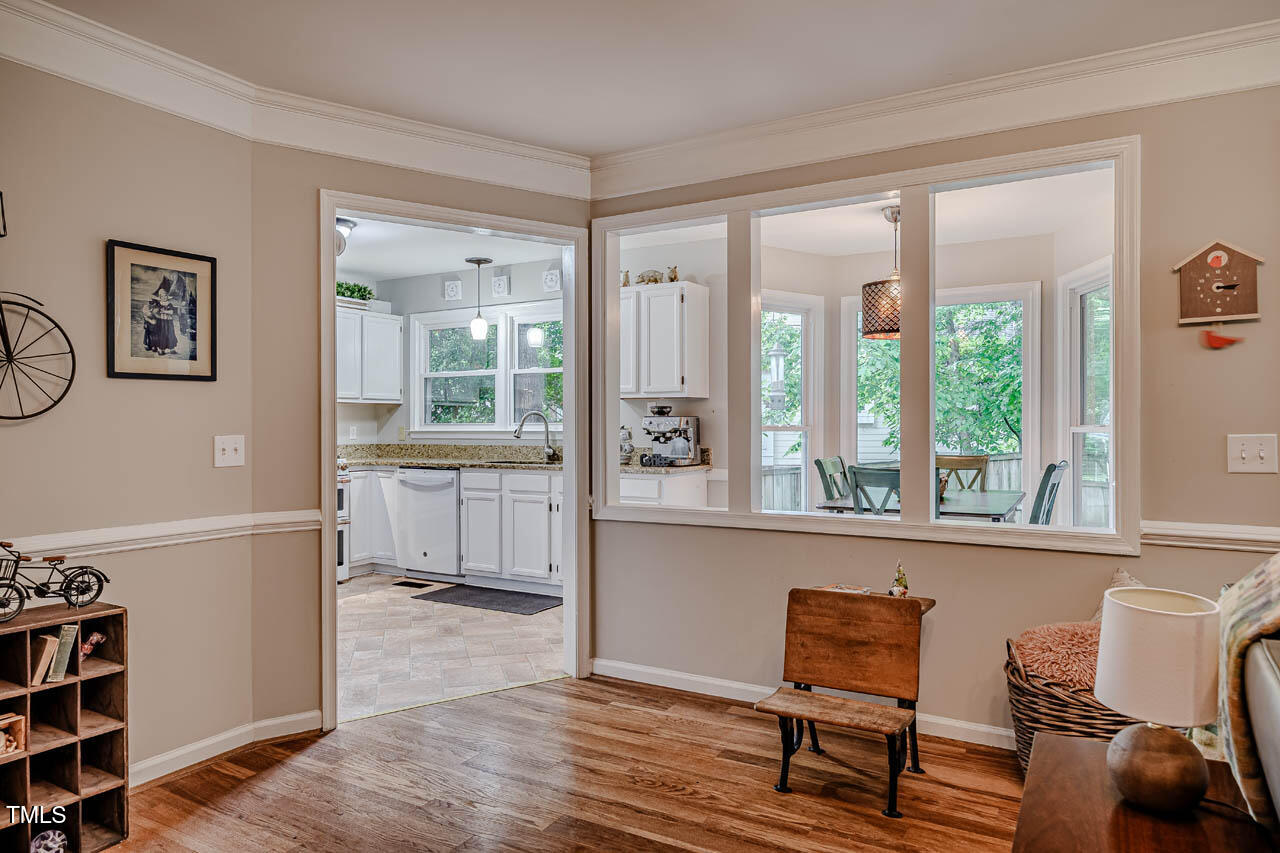 8 Wexford Drive Durham, NC 27713 - Photo 14 of 38 a living room with furniture and a window