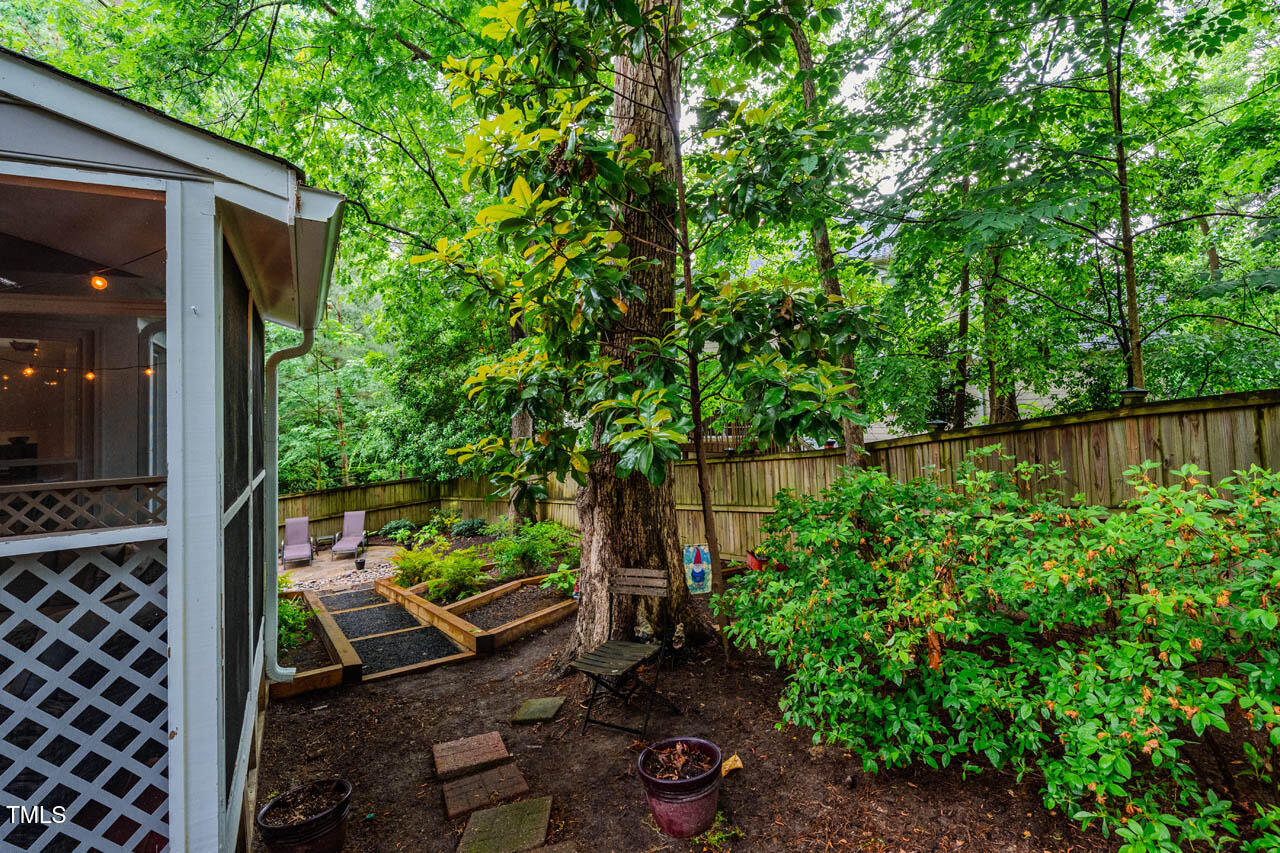 8 Wexford Drive Durham, NC 27713 - Photo 29 of 38 a backyard of a house with lots of green space