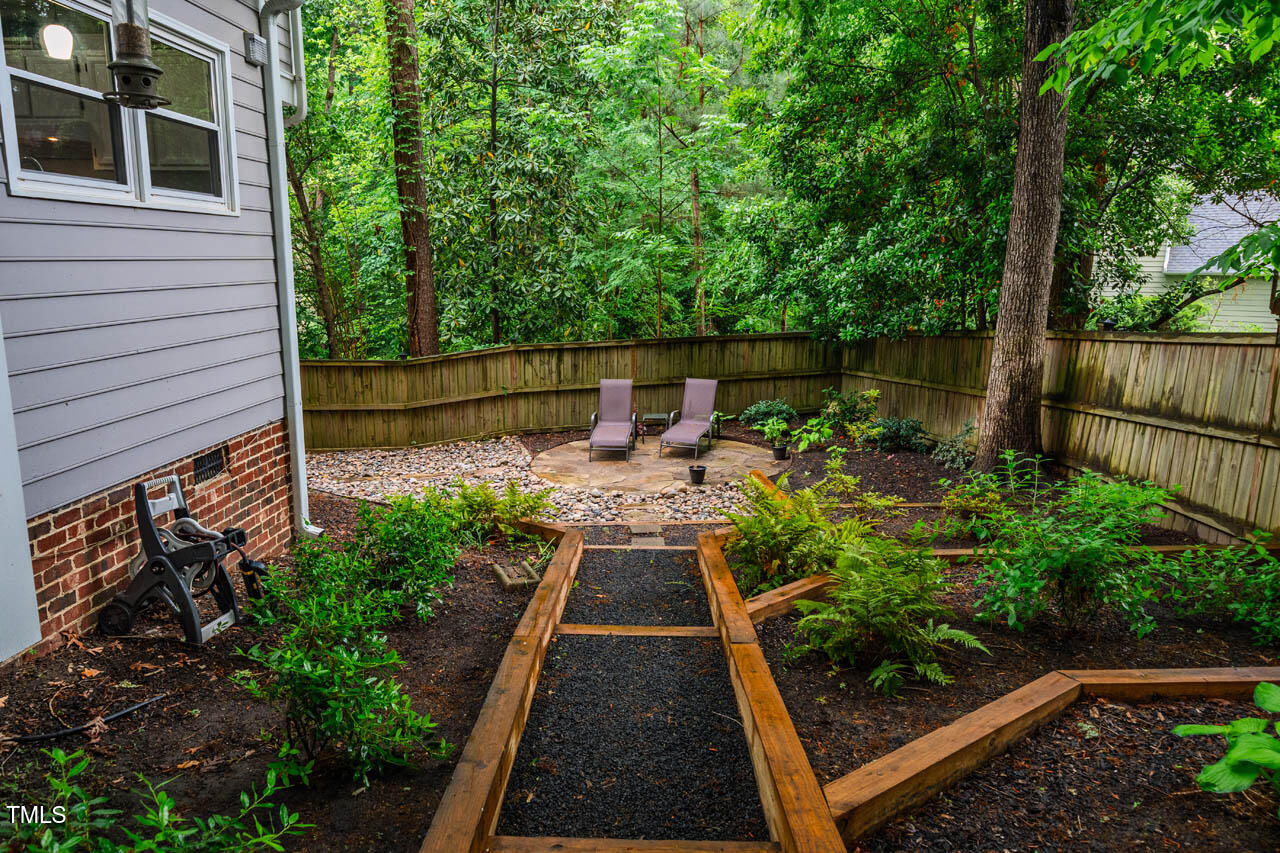 8 Wexford Drive Durham, NC 27713 - Photo 30 of 38 a view of a backyard with sitting area
