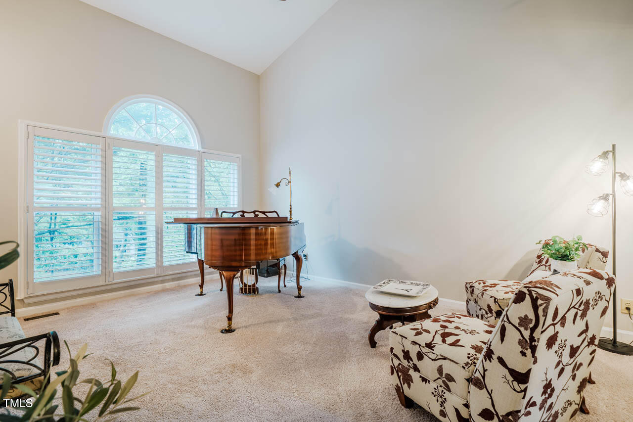 8 Wexford Drive Durham, NC 27713 - Photo 5 of 38 a living room with furniture and a large window