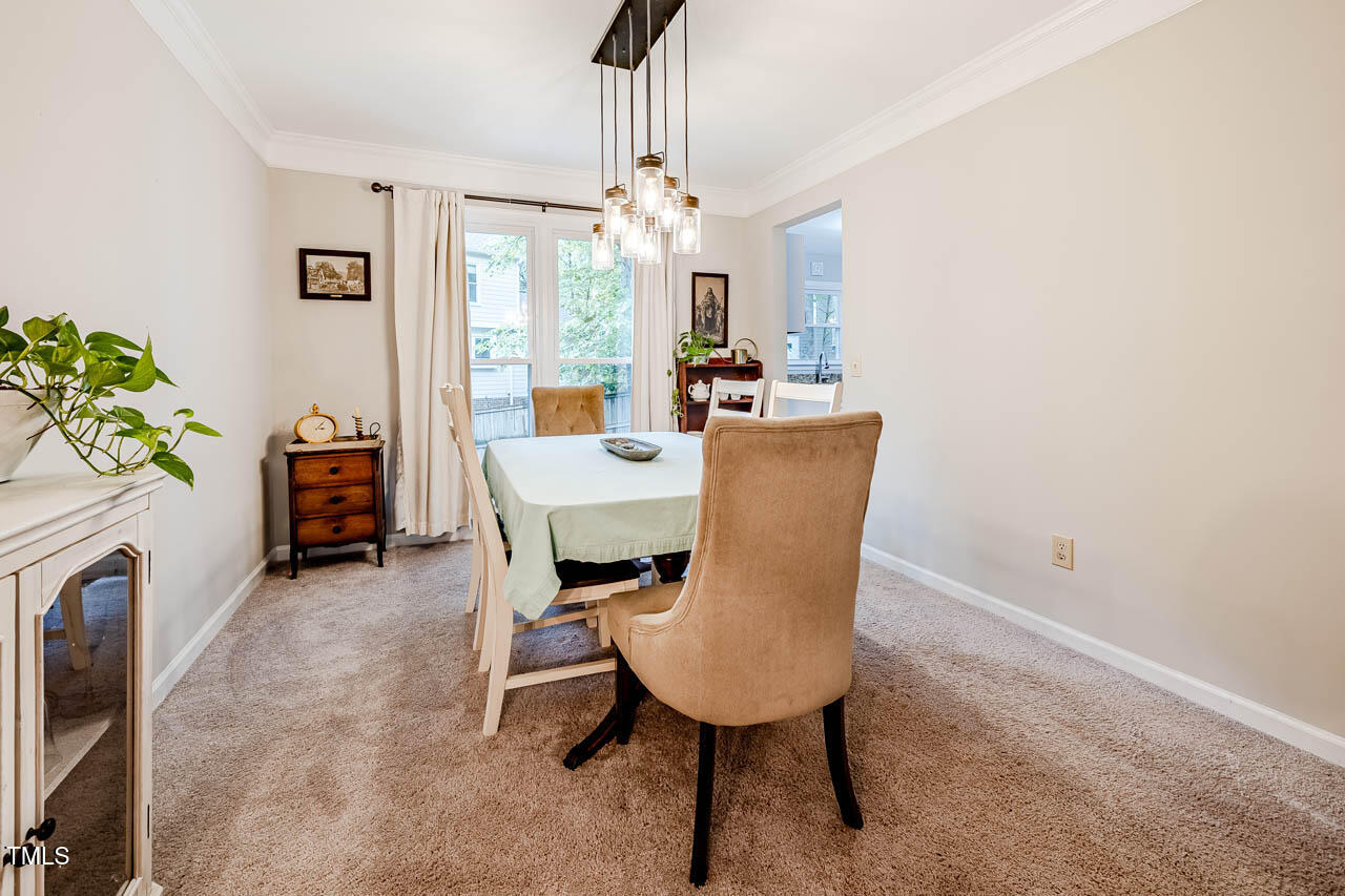 8 Wexford Drive Durham, NC 27713 - Photo 8 of 38 a dining room with furniture and window