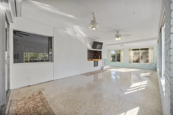 a view of a living room and dining room