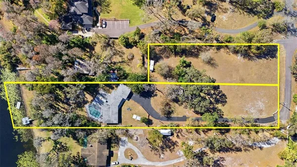 an aerial view of residential house with outdoor space