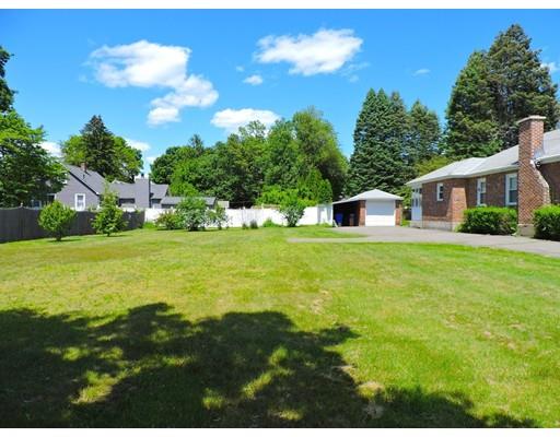 1780 Wilbraham Road Springfield, MA 01119 - Photo 3 of 19 a house view with swimming pool and trees in the background