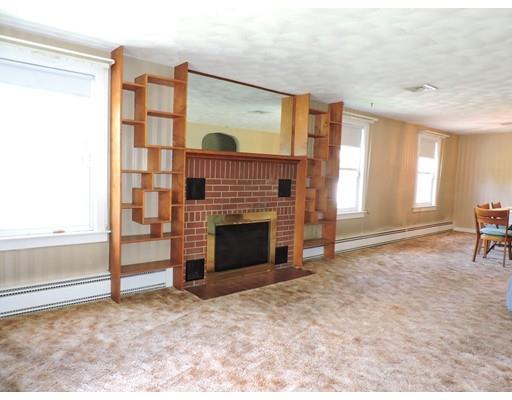 1780 Wilbraham Road Springfield, MA 01119 - Photo 6 of 19 a view of a livingroom with a fireplace and window