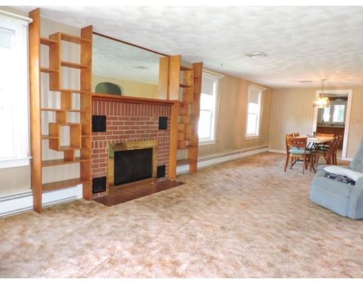 1780 Wilbraham Road Springfield, MA 01119 - Photo 7 of 19 a view of livingroom with fireplace and workspace