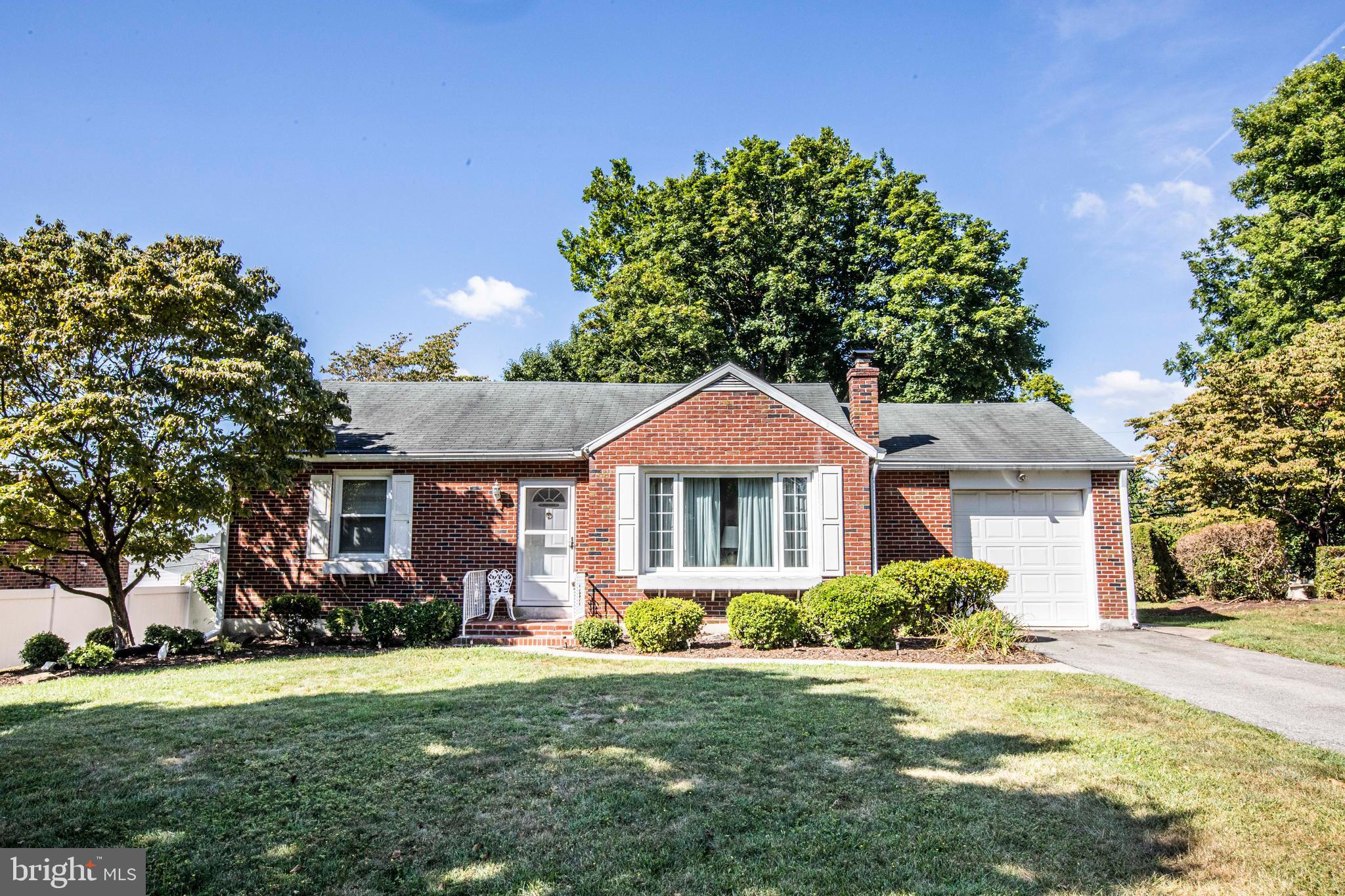 3328 Stoudts Ferry Bridge Road Reading, PA 19605 - Photo 1 of 29 front view of a house with a yard