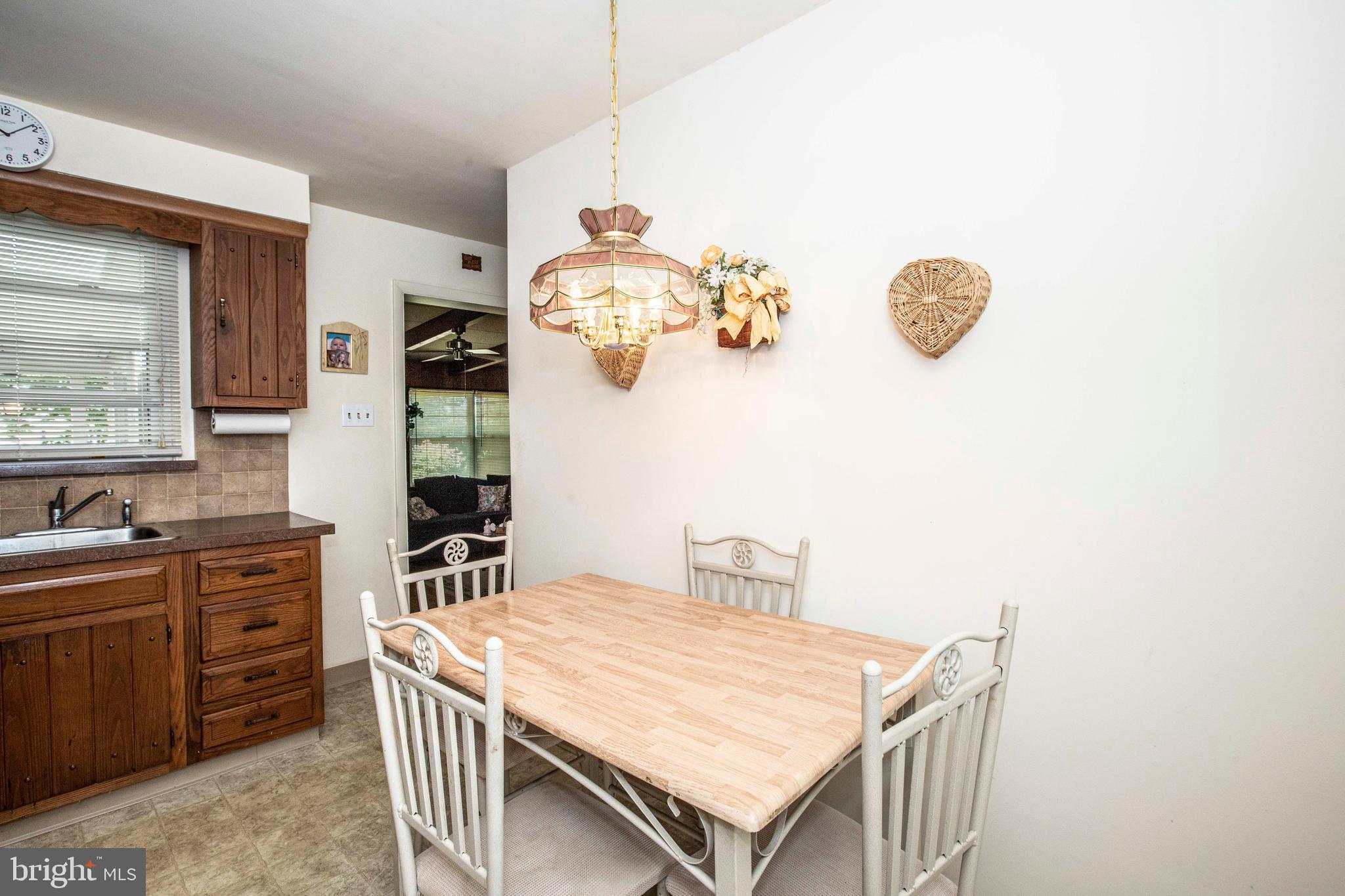 3328 Stoudts Ferry Bridge Road Reading, PA 19605 - Photo 14 of 29 a dining room with a table and chairs