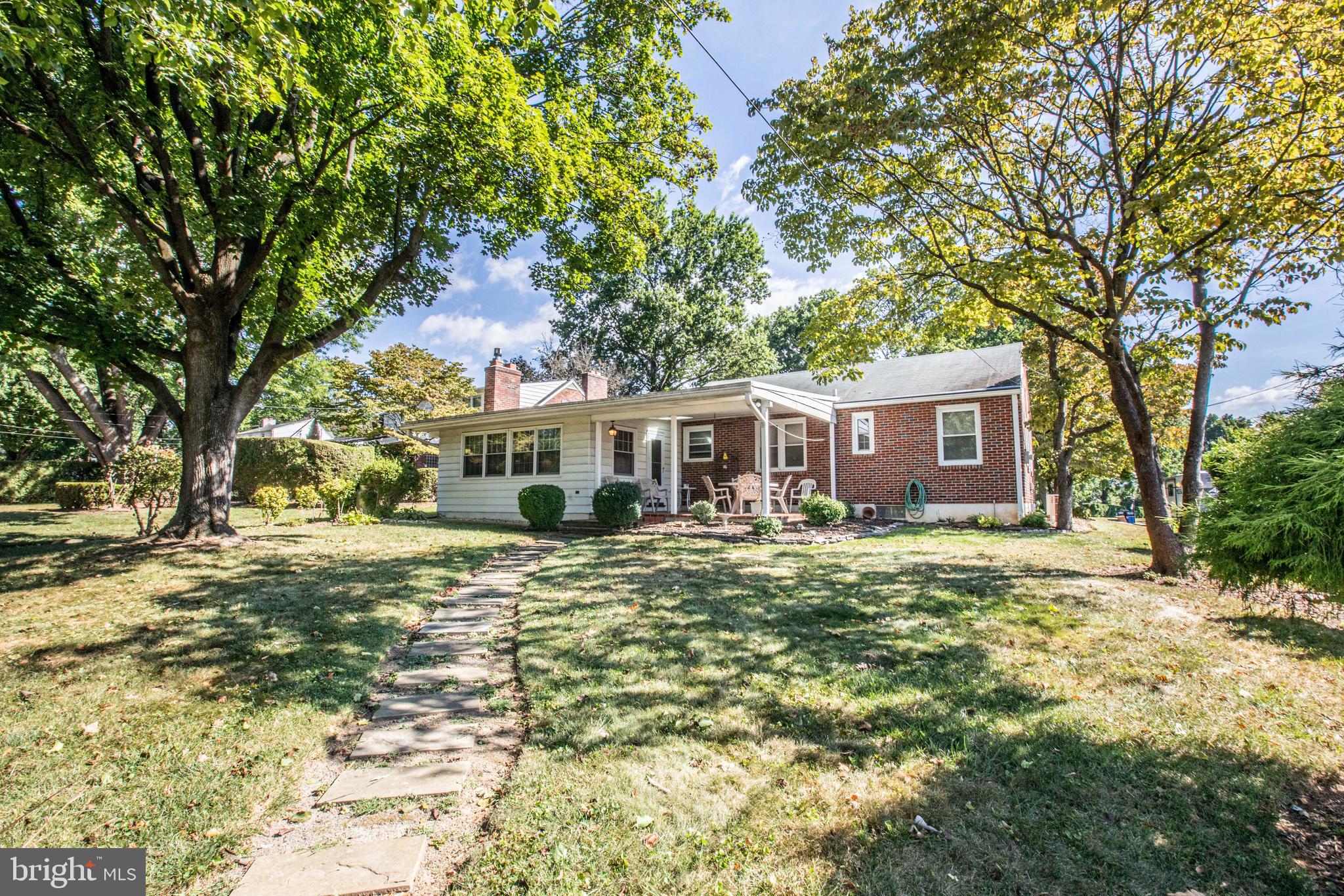 3328 Stoudts Ferry Bridge Road Reading, PA 19605 - Photo 25 of 29 a front view of a house with a garden